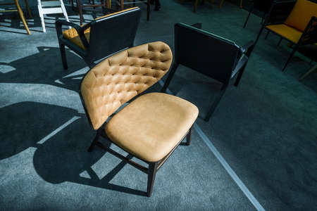 store arm-chairs, stylish modern chairs in a furniture store