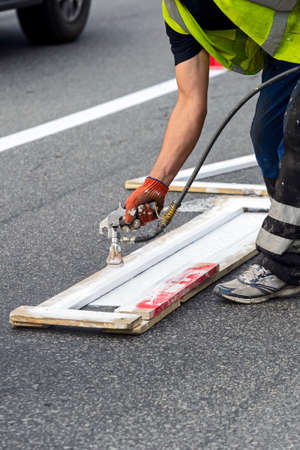 Manual painting of roads and markingの写真素材