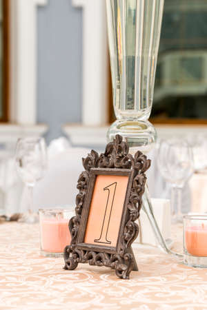 table reservation at a restaurant in openwork frame