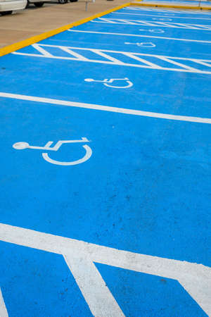Sign of a disabled person on asphaltの写真素材