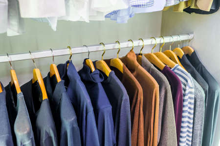 Wardrobe with jumpers and pulloversの写真素材