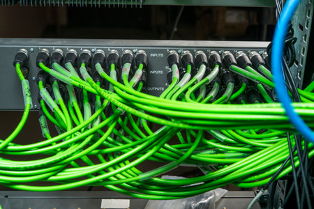 Green and network cables connected to the server