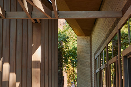 Construction of a wooden beam in interior decoration with metal fasteners in architecture, a design element of the construction of the facade of the buildingの写真素材