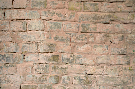 brick stone wall of the house, territory fencing, shot close-upの写真素材