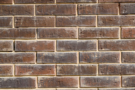 brick stone wall of the house, territory fencing, shot close-upの写真素材