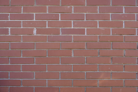 brick stone wall of the house, territory fencing, shot close-upの写真素材
