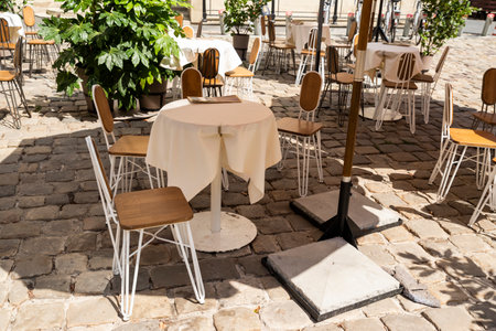 tables and chairs, outdoor furniture for restaurants on a sunny dayの写真素材