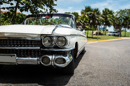 White Convertible classic car in front view in Cubaの写真素材