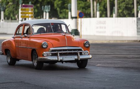 American classic car with white roof drived in Havana City Cubaのeditorial素材