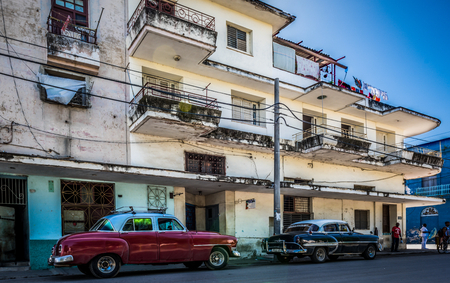 HDR - Street life view with parked Buick and Chevrolet american classic cars in Santa Clara Cuba - Cuba Series Reportのeditorial素材
