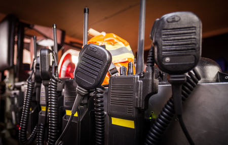 HDR - Firefighter gear in a fire truck with walkie talkiesの写真素材