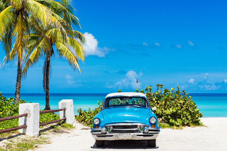 American blue classic parked car on the beach at Varadero Cuba - Series Cuba Reportageのeditorial素材