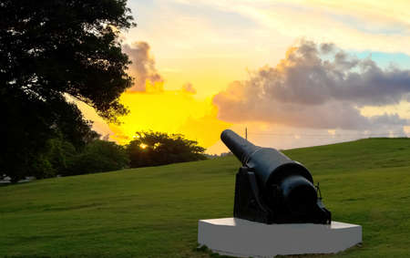 Old cannon at the fortress Castillo de los Tres Reyes del Morro in the light of sunrise in Havana City Cuba - Serie Cuba Reportageのeditorial素材