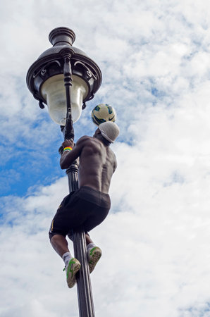Acrobat with a soccer ball in Montmartre, Paris, Franceのeditorial素材