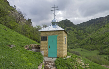 Orthodox chapel in the mountains  Gorge Aksaut, Caucasus, Russia 