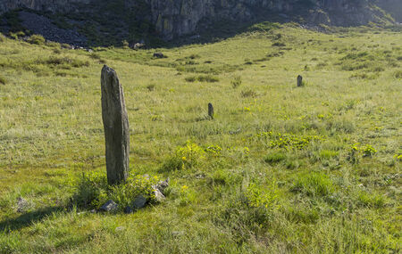 Three-stone menhirs, Altai, Russia. Katun river bankの写真素材