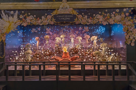 PARIS, FRANCE - NOVEMBER 16, 2015: Festive window dressing in Parisian department stores for Christmas. Fantastic scene - dancing of fairy rosesのeditorial素材
