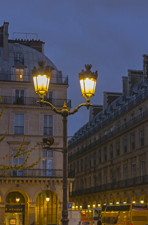 The double old-fashioned lantern at the Paris street. Late eveningの写真素材