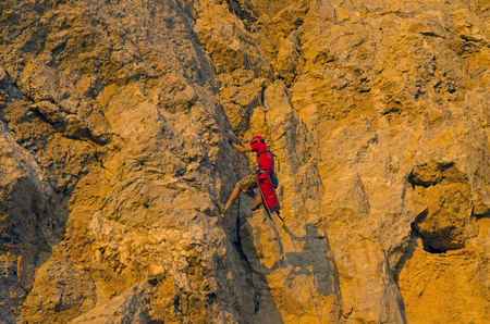 Rock climber on a steep rock. Cape Alchak Crimea.の写真素材