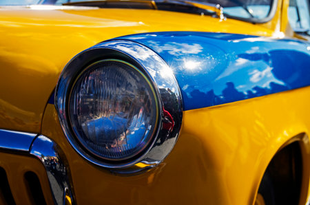 MOSCOW, RUSSIA - OCTOBER 1, 2016: Headlamp of an old legendary Soviet car Volga GAZ M-21. Police car coloring.のeditorial素材