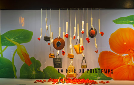 PARIS, FRANCE - MARCH 27, 2017:  Fashion accessories in the showcase of the Printemps department store in Paris, France. Spring and summer theme.のeditorial素材