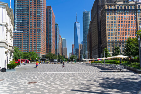 NEW YORK CITY - AUGUST 24, 2017: New York, Manhattan. View from Battery Park along Little West Street towards the Freedom Tower (1 World Trade Center). Sunny summer day.のeditorial素材