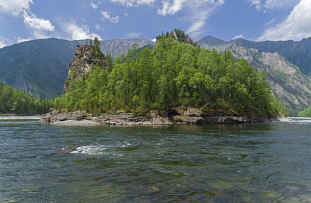 The Oka Sayanskaya River in the Orkho-Bom gorge. A sharp turn of the river bed  before the the rapids "Okinski". Sunny summer day. Buryatia, Siberia, Russia.の写真素材