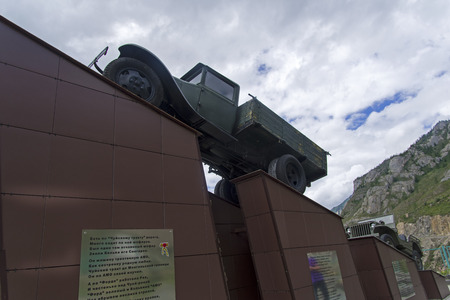 Monument to the characters of the song of M. Mikheev "There is a road along the Chuysky Trakt" on the bank of the river Chuya. August. Altai Mountains, Siberia, Russia.の写真素材