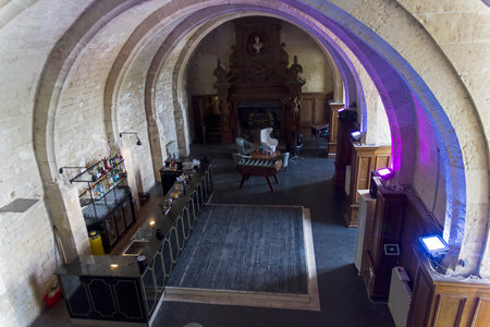 Bar in the chimney hall of the old castle. Castle Grand Mello, France.のeditorial素材