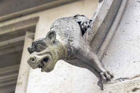 Gargoyles on the wall of a medieval building. Rouen, France.の写真素材