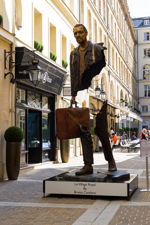 Paris, France - September 3, 2018: Street exposure of the artworks of Bruno Catalano on the Parisian shopping street Le Village Royal.のeditorial素材