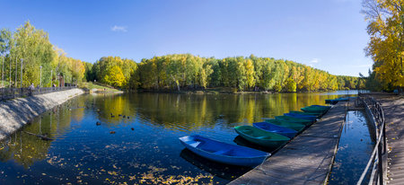 Boat station closed at the end of the season. Pond in the landscape reserve Teply Stan, Moscow, Russia. Sunny day in October.のeditorial素材
