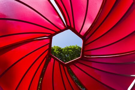 The original roof of the tent in the park, made in the form of a diaphragm of the lens.の写真素材