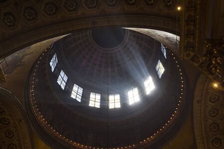 Rays of light under the dome of the Orthodox Cathedral. Kazan Cathedral, Saint Petersburg, Russia.の写真素材