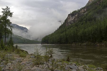 The beginning of the Orkho-Bom gorge, along this gorge the Sayan Oka  river crosses the Sayansk ridge. Buryatia, Siberia, Russia.の写真素材
