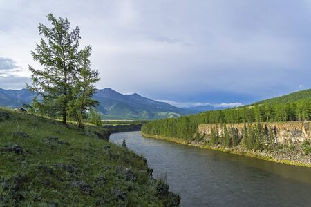 High steep banks of the Oka Sayan River. East Sayan, Buryatia, Siberia, Russia.の写真素材