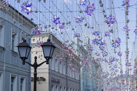 Street illumination against the blue sky. Kuznetsky Most Street, Moscow, Russia.の写真素材