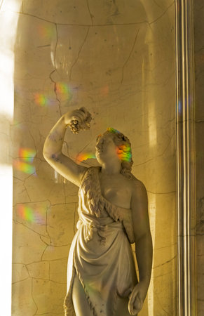Saint Petersburg - November 23, 2019: Rainbow spots of sunlight on a marble copy of an ancient Greek sculpture. Pavilion Hall of the Small Hermitage. The State Hermitage Museum, St. Petersburg, Russia.のeditorial素材