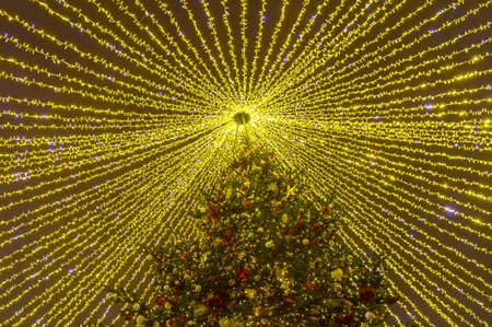 Large Christmas tree outdoors. Revolution Square, Moscow, Russia,.
