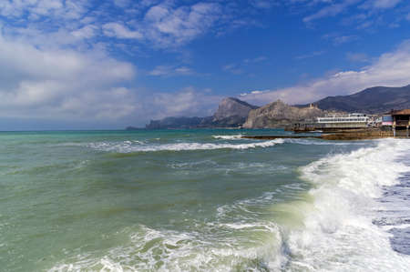 Seascape. View from the foot of Cape Alchak towards the village of Novyy Svet. Sudak, Crimea, end of...