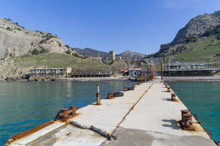 View from the pier to a small bay. The resort town of Sudak, Crimea. Out of season, end of April.の写真素材