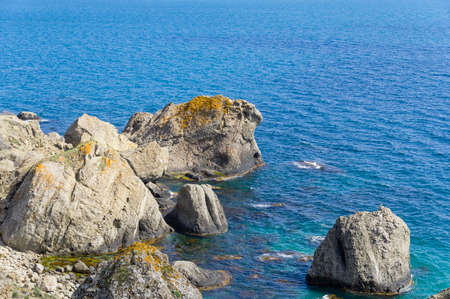 A stone of an unusual and bizarre shape. Black Sea coast at Cape Meganom, Crimea.の写真素材