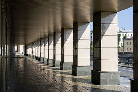 Long passage with columns. Office building at Ovchinnikovskaya Embankment, Zamoskvorechye, Moscow,...