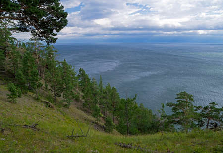 View of Lake Baikal from the slope of the rock Skriper. Not far from the Great Baikal Trail. Pribaikalsky National Park, Irkutsk region. August.の写真素材