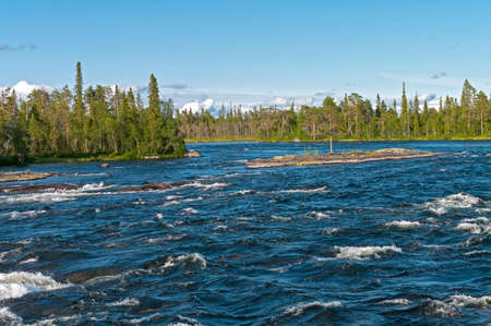 Beginning of the Kanozerskiy Rapid on the Umba river, Kola Peninsula, Murmansk Oblast, Russia. Sunny day in August.の写真素材
