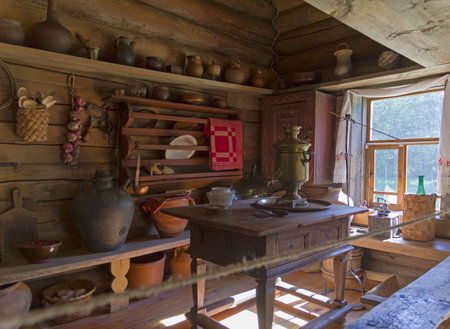 Vitoslavitsy, Veliky Novgorod, Russia - September 10, 2022: Interior and household items in a peasant's hut of the late nineteenth century. Museum of Wooden Architecture.のeditorial素材