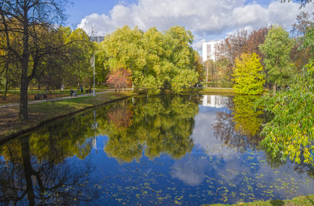 Pond in Vorontsovsky Park, Moscow, Russia. Sunny day in October.の写真素材