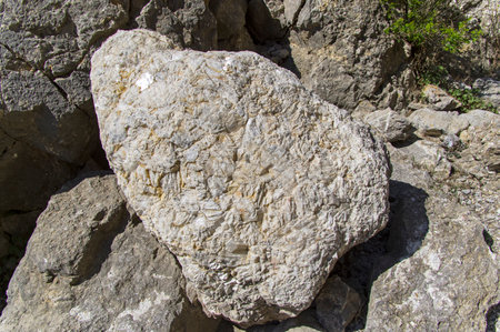 A big stone composed of calcite crystals. Cape Alchak, Sudak, Crimea.