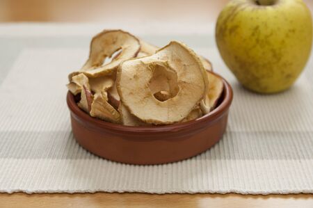 Close up view of organic Dried Apples in a bowlの写真素材