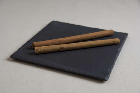 Close-up view of Cinnamon Stick on a plateの写真素材